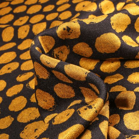 Tissu Maille polyviscose Ronds destructurés jaune sur fond Noir