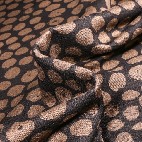 Tissu Maille polyviscose Ronds destructurés marron sur fond Noir