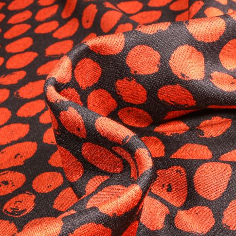Tissu Maille polyviscose Ronds destructurés orange sur fond Noir