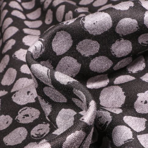Tissu Maille polyviscose Ronds destructurés gris clair sur fond Noir