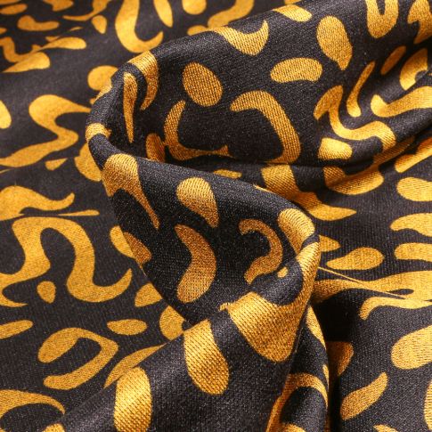 Tissu Maille polyviscose Anna Motifs abstraits jaunes sur fond Noir