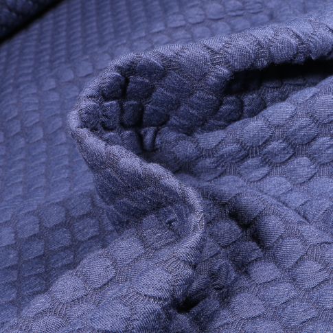 Tissu Sweat matelassé Eleonora Alvéolé sur fond Bleu marine