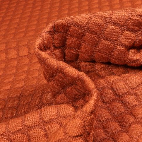 Tissu Sweat matelassé Eleonora Alvéolé sur fond Brique