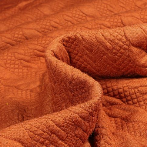 Tissu Sweat matelassé Torsade sur fond Orange