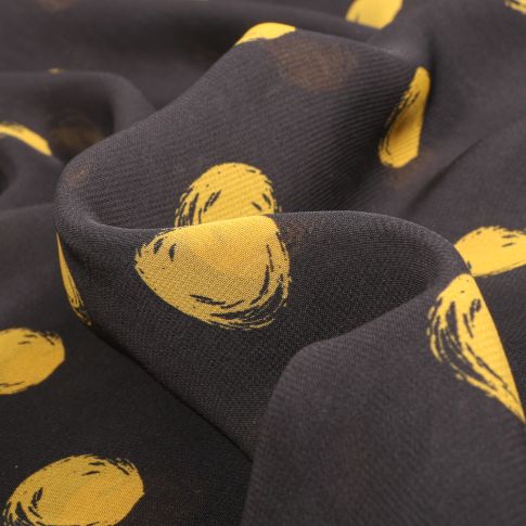 Tissu Mousseline Pois 3 cm jaune sur fond Noir
