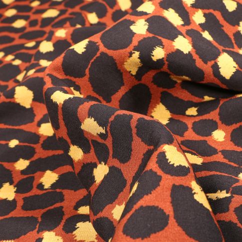 Tissu Viscose Fauve sur fond Brique