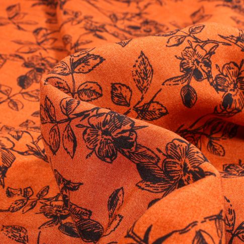 Tissu Viscose Popeline Esquisse fleuris sur fond Orange