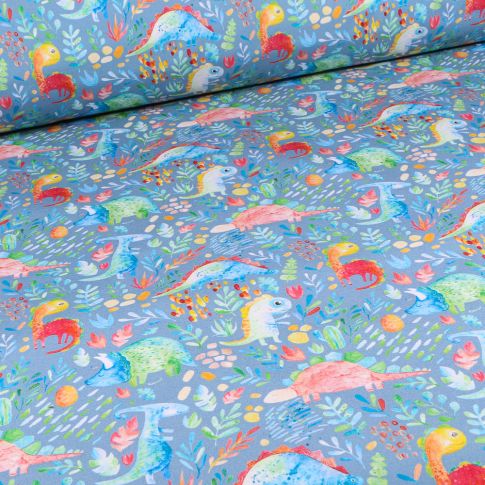 Tissu Softshell Dinosaures multicolores sur fond Bleu clair