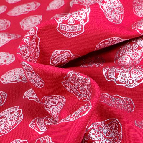 Tissu Jersey Coton Têtes de morts métallisées sur fond Rouge