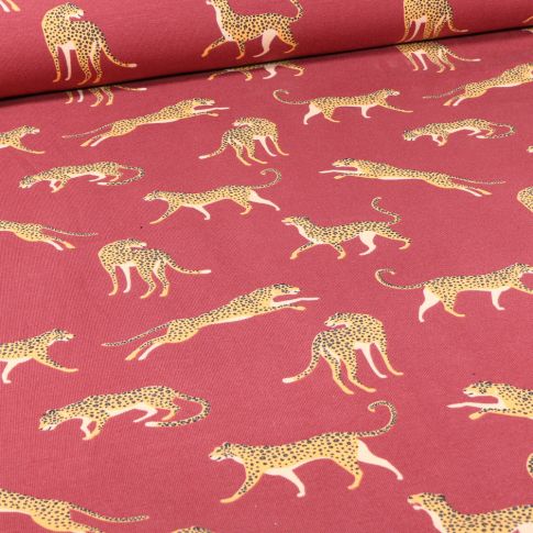 Tissu Jersey Coton Léopard sur fond Rouge