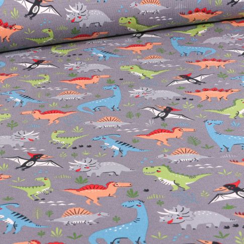 Tissu Jersey Coton Dinosaures multicolores sur fond Gris