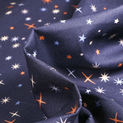 Tissu Coton imprimé Etoiles scintillantes sur fond Bleu marine