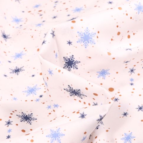Tissu Coton imprimé Flocons de neige et étoiles sur fond Blanc cassé