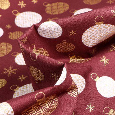 Tissu Coton imprimé Boules de décoration dorées noël sur fond Bordeaux