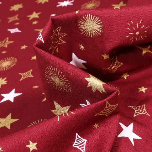 Tissu Coton imprimé Etoiles différentes formes sur fond Bordeaux