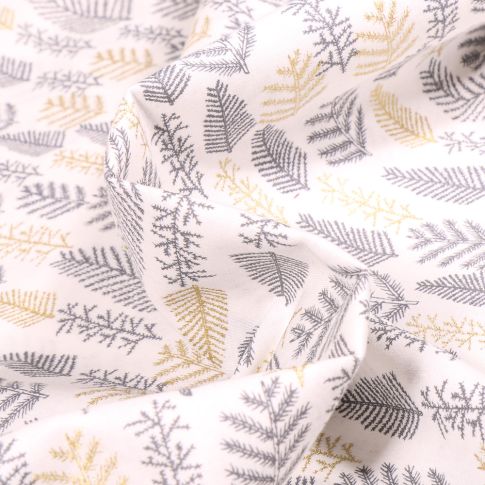 Tissu Coton imprimé Feuilles de sapins dorées et blanches sur fond Blanc