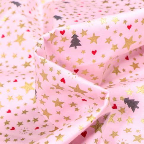 Tissu Coton imprimé Sapins et étoiles dorées sur fond Rose