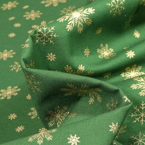 Tissu Coton imprimé Flocons de neige dorés sur fond Vert foncé