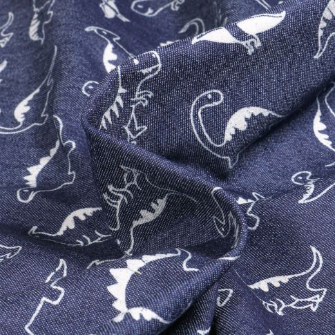 Tissu Jean Denim extensible Dinosaures sur fond Bleu nuit