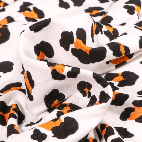 Tissu Jersey Viscose  Léoprint sur fond Blanc