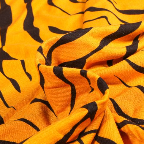 Tissu Jersey Viscose  Zébré noir sur fond Jaune