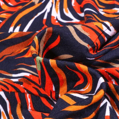Tissu Jersey Viscose  Lignes abstraites colorées sur fond Bleu marine