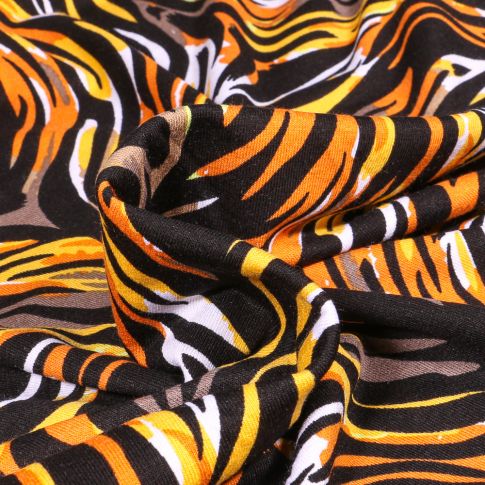 Tissu Jersey Viscose  Lignes abstraites colorées jaune sur fond Noir
