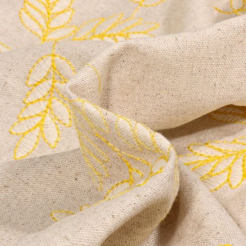 Tissu Lin Viscose Feuilles brodées jaune sur fond Naturel