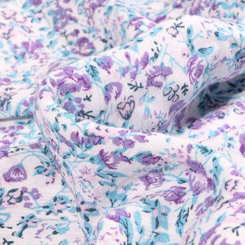 Tissu Viscose texturé Coqueli bleu sur fond Blanc