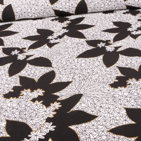 Tissu Crêpe Georgette Grandes et petites fleurs noires pailletés sur fond Blanc
