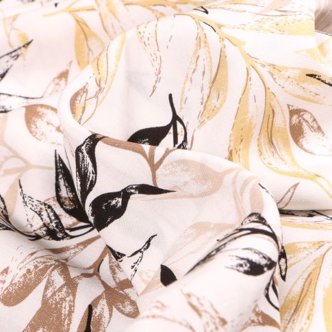 Tissu Viscose Feuillages pastels beige sur fond Blanc cassé