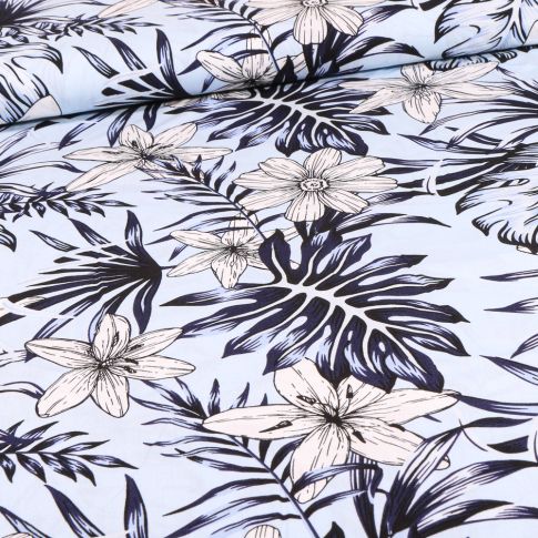 Tissu Viscose Feuilles de palmier et fleurs sur fond Bleu ciel