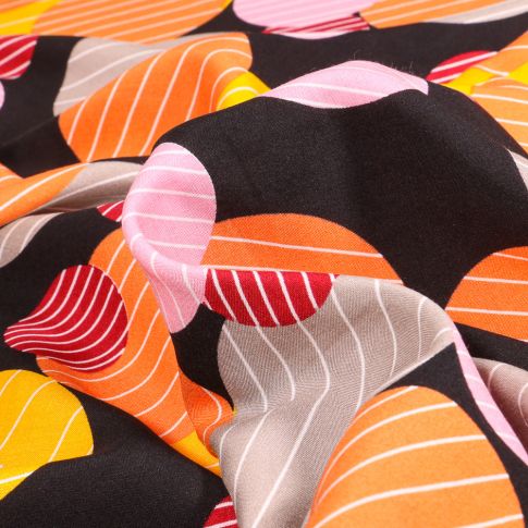 Tissu Viscose Grands cercles rayés colorés sur fond Noir