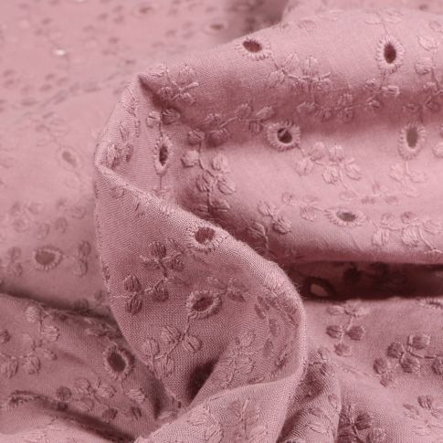 Tissu Broderie anglaise coton ajouré uni Andrea sur fond Vieux rose