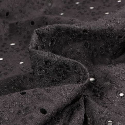 Tissu Broderie anglaise coton ajouré uni Andréa sur fond Noir
