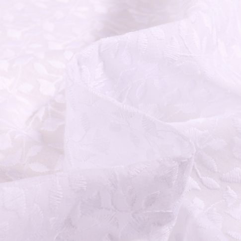 Tissu Coton brodé uni Esperanza sur fond Blanc