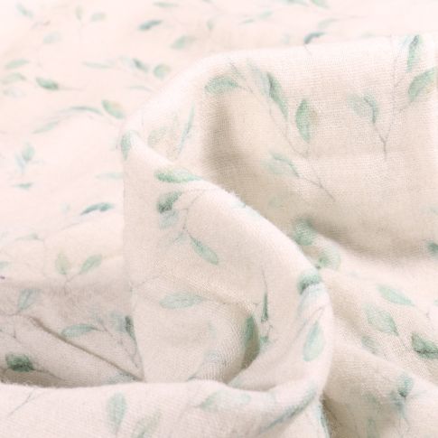 Tissu Double gaze Feuilles pastels sur fond Blanc cassé