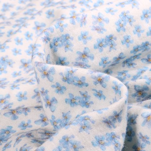 Tissu Double gaze Fleurs bleues sur fond Blanc