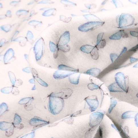 Tissu Double gaze Papillons bleus sur fond Blanc