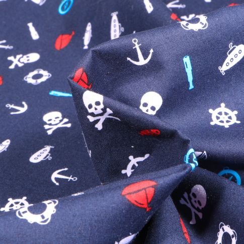Tissu Coton imprimé Motifs marins et têtes de mort sur fond Bleu marine