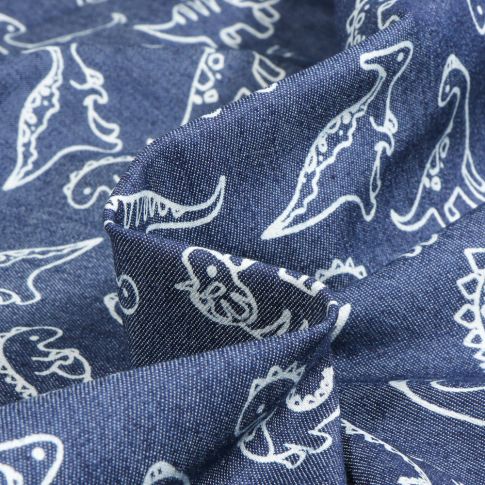 Tissu Chambray Dino's sur fond Bleu jean