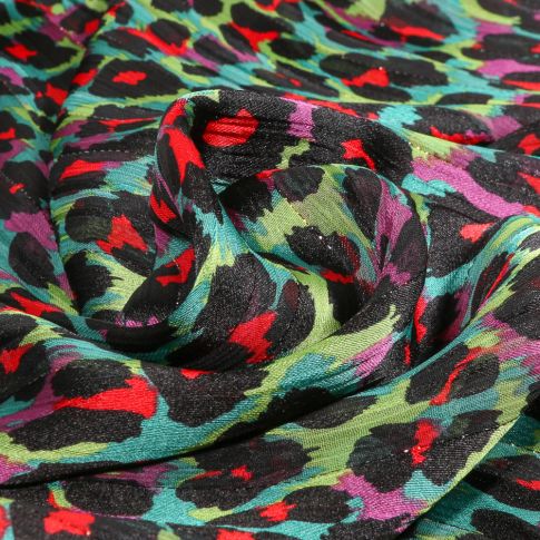 Tissu Mousseline lurex Guépard néon sur fond Vert émeraude