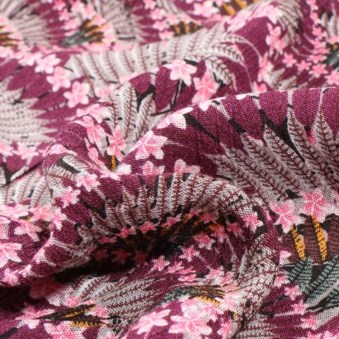 Tissu Crépon viscose Plumes de fleurs sur fond Violine