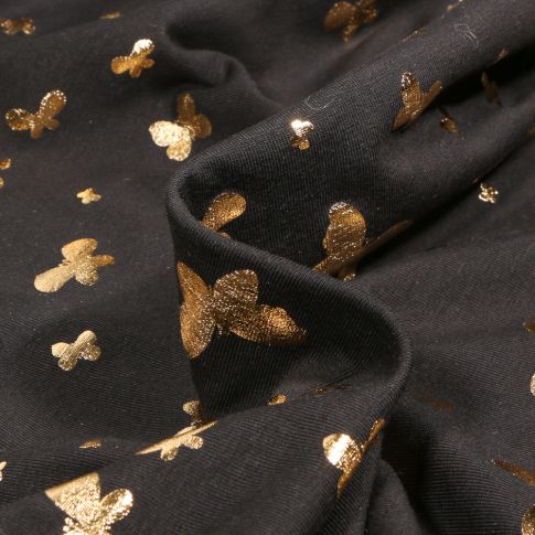 Tissu Jersey Coton Papillons métalissés sur fond Noir
