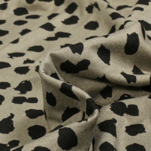 Tissu Jersey Viscose  Tâches noir sur fond Vert kaki