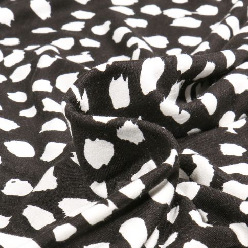 Tissu Jersey Viscose  Taches sur fond Noir
