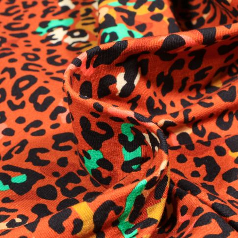 Tissu Jersey Coton Animal print sur fond Orange