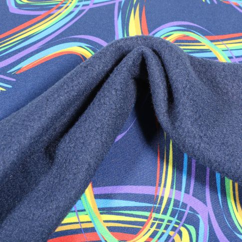 Tissu Softshell Coeurs multicolores sur fond Bleu