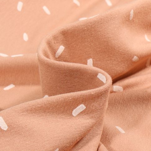 Tissu Jersey Coton Conféttis blancs sur fond Cassonade