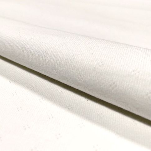 Tissu Jersey Coton ajouré Baby Blanc cassé